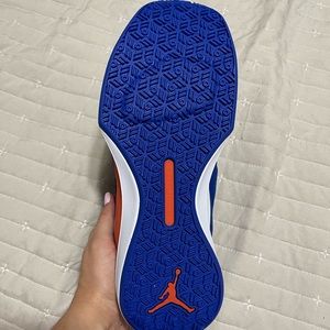 Orange and blue Jordan’s. Size 10 never worn